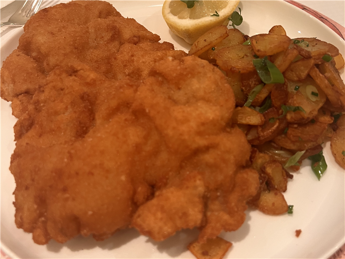 schnitzel and fried potatoes